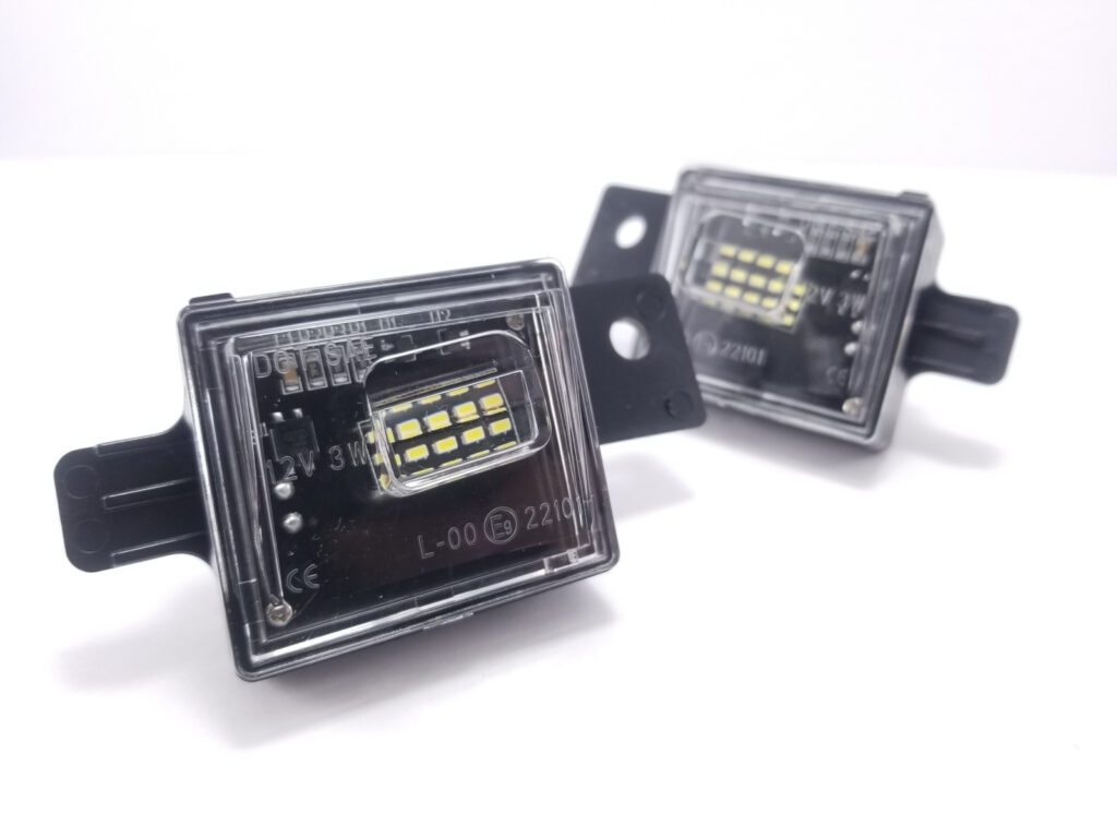 Lumenz Full LED License Plate Lights - Clear Lens - Chevrolet Silverado/GMC Sierra (2015-2025)