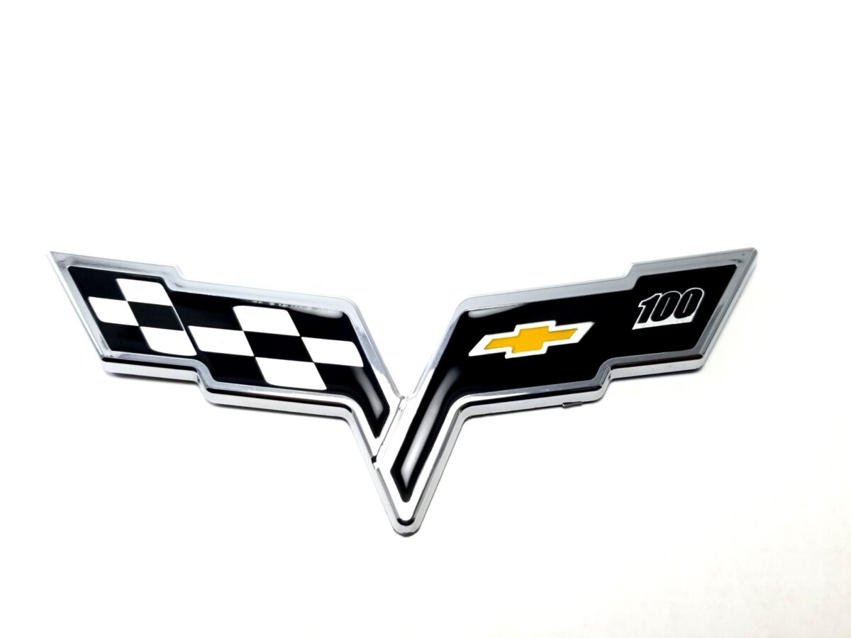 Corvette C6 Centennial Cross Flags 100 Years Bumper Emblem (2005 - 2013)