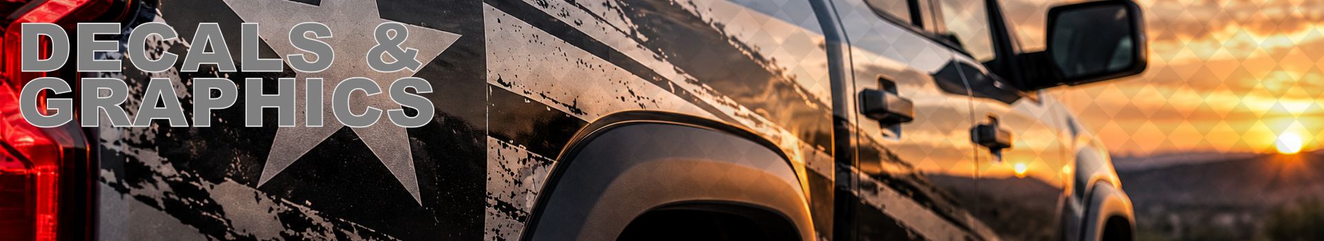 Black truck with a bold star and graphic vinyl decal wrap on the rear side panel